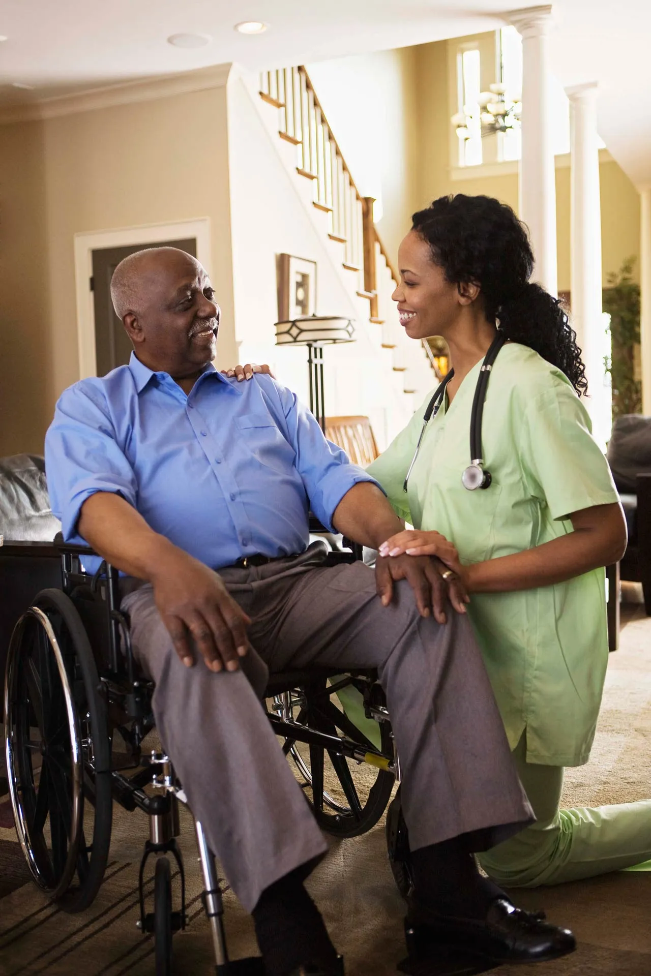 A caregiver providing personal care assistance to a senior